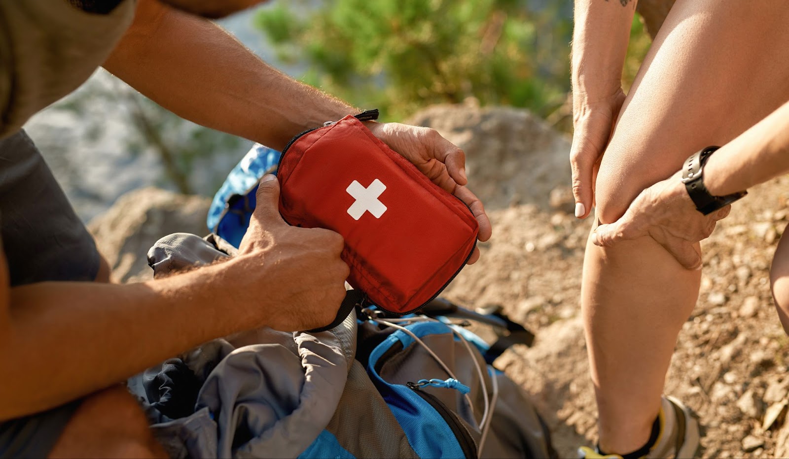 Emergency kit being applied to a leg in Mexico during a hunting expedition with guides